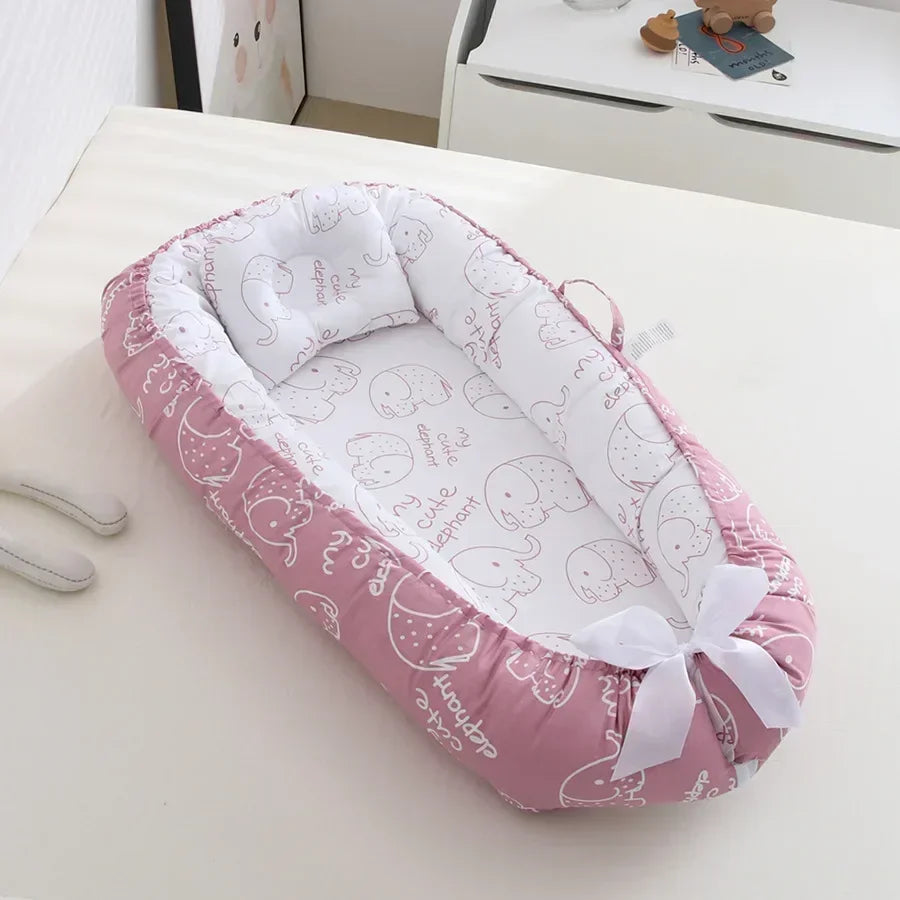 bebe reducteur de lit adorable